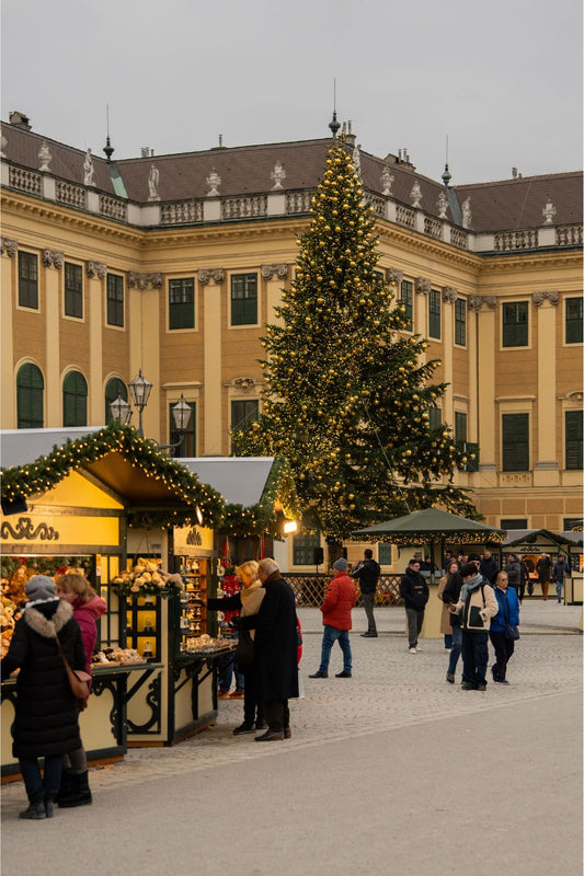 The Courtyard of Schoenbrunn Palace, near Vienna, with its Christmas Market and the big Christmas Tree