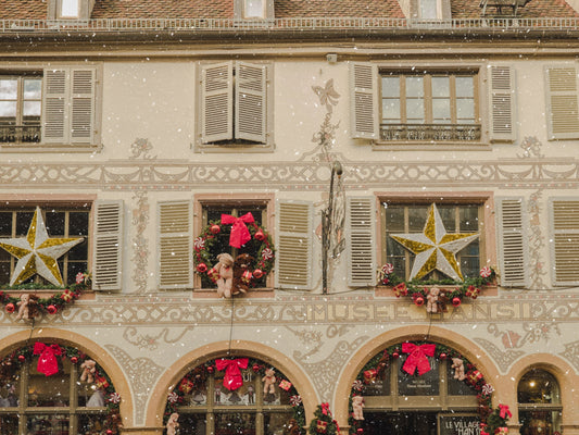The façade of the Musée Hansi toy store in Colmar, Alsace, decorated for Christmas