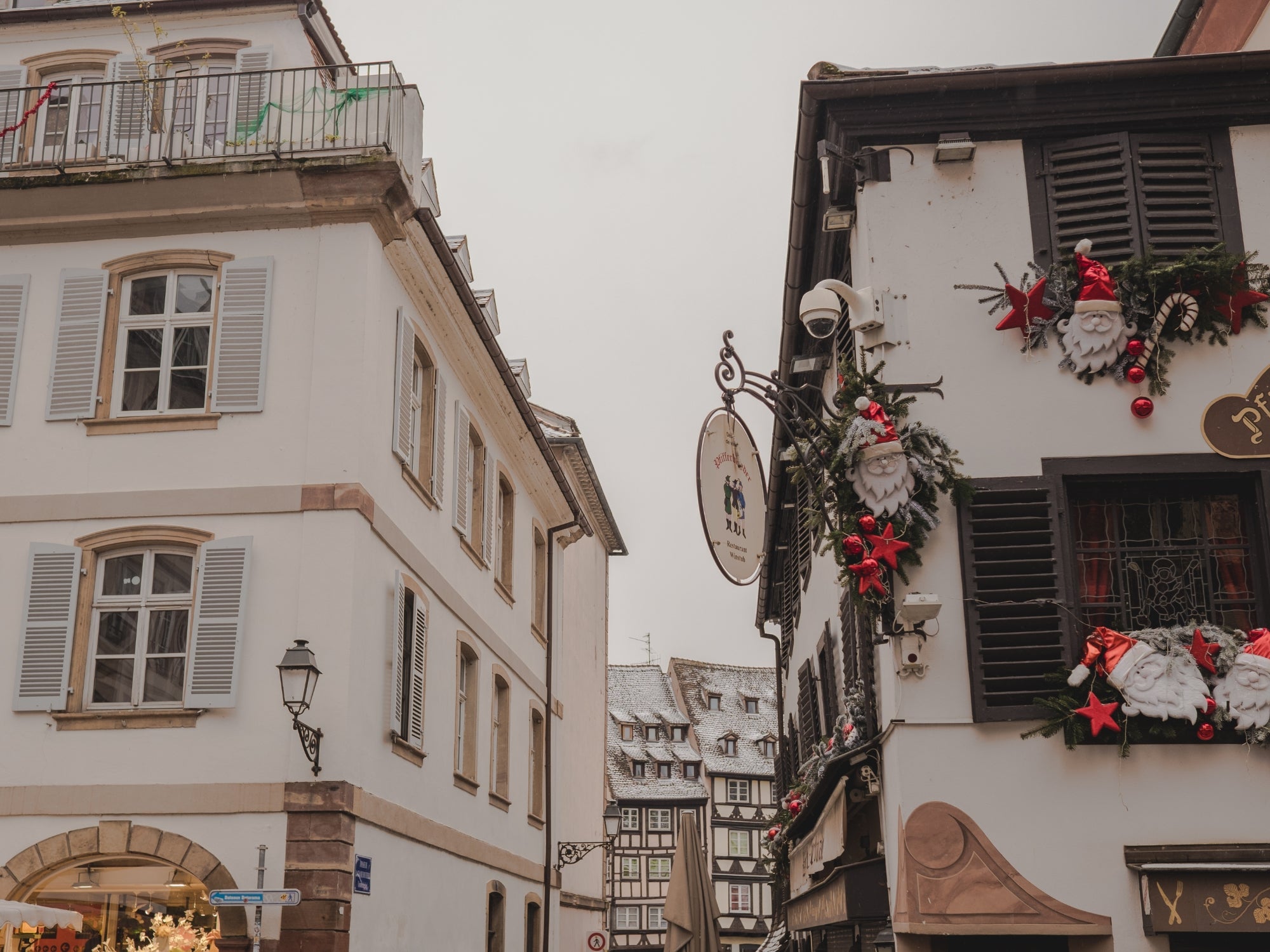 The streets of Strasbourg decorated for Christmas on a snowy morning of December