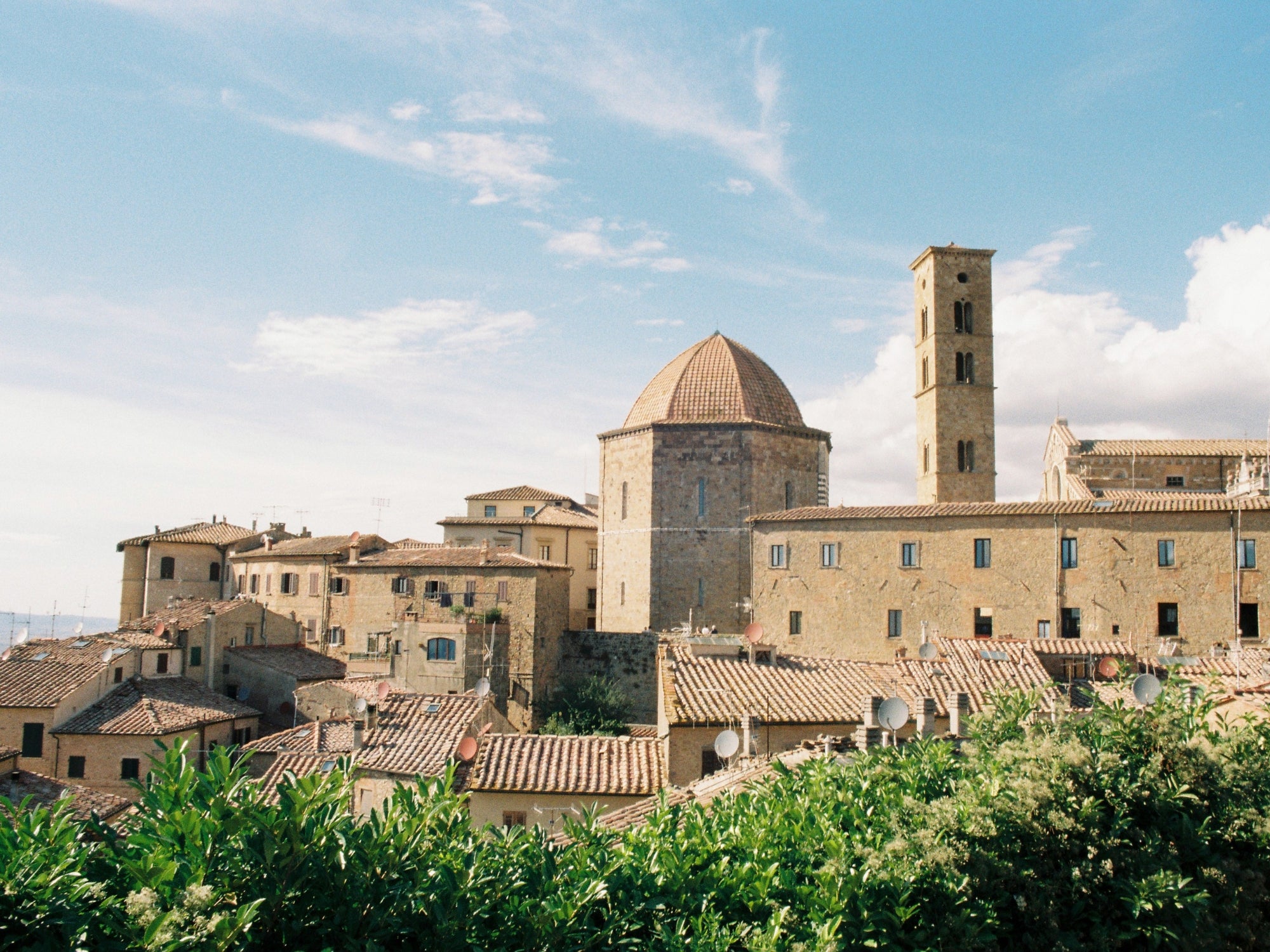 Views of the Dome of and Tower of the Church of the hilltop town of Volterra, in Tuscany
