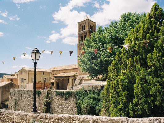 The church tower of Moustiers-Sainte-Marie, in Provence, across the river that crosses this medieval hilltop village