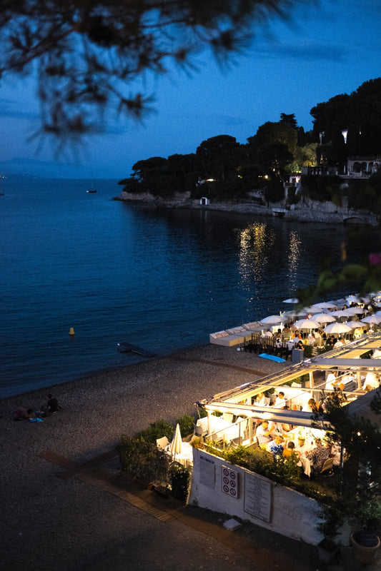 Plage Paloma, in Cap Ferrat, on the French Riviera, at night, with the beach club all set up for dinner