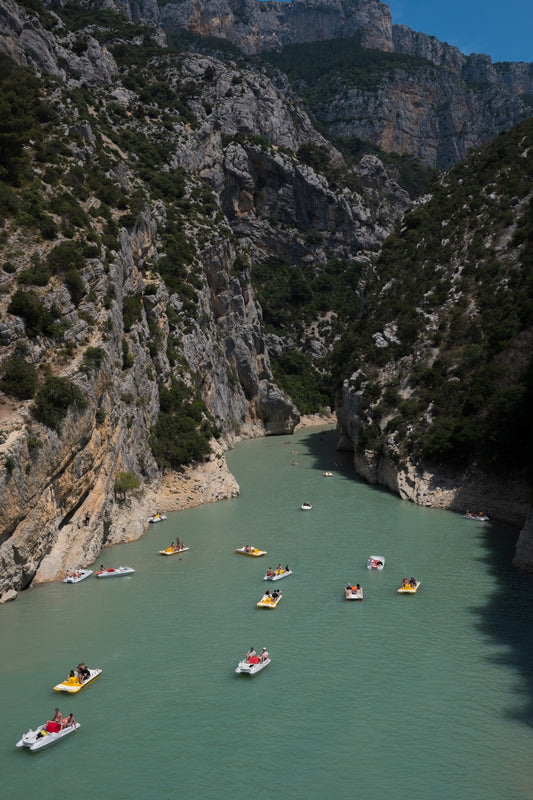 Gorges du Verdon with its glacial blue waters and paddleboats running up and down the river, in Provence