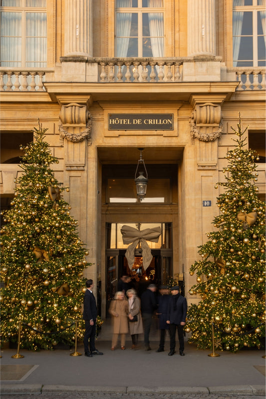 The entrance of Hôtel de Crillon, in Paris, with two big and fully decorated Christmas Trees