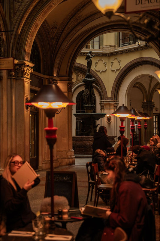 Tables set for dinner at the Ferstel Passage in Vienna