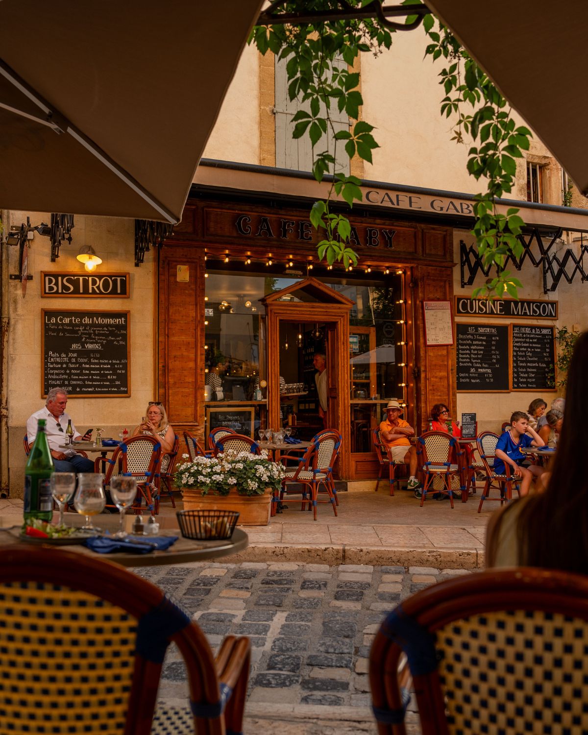 Local wooden bistrot in Lourmarin. cobblestone streets.